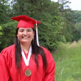 Ahbrianna, a Cookson Hills graduate, smiling as a student at Ozark Christian College