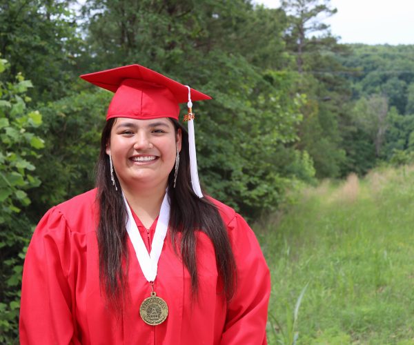 Ahbrianna, a Cookson Hills graduate, smiling as a student at Ozark Christian College
